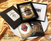 Edible 'Milagro' gift box set- contains one dark chocolate anatomical votive and one orange infused, edible, Sacred Heart greeting card.