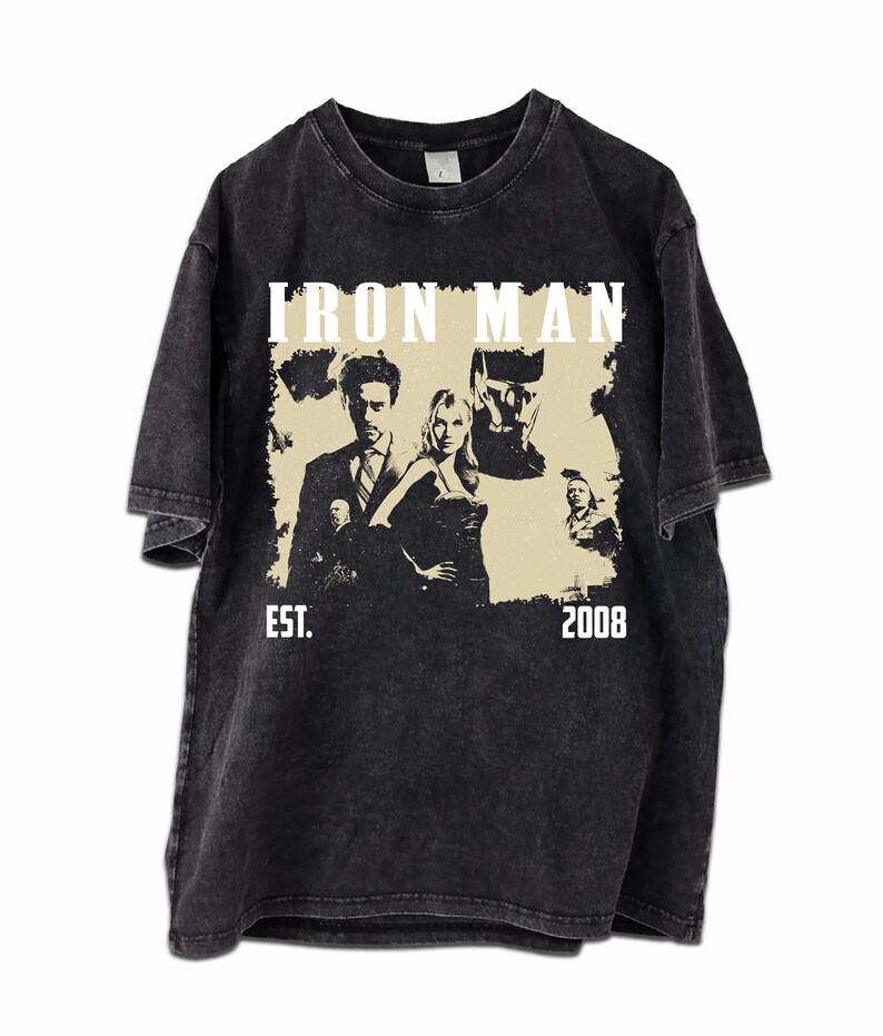 May include: A white ceramic mug with a black handle and the text "But First, Coffee" in a handwritten style. The mug is on a white surface. The mug is approximately 10 cm tall.