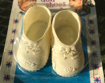 plastic dolly shoes