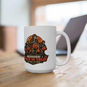 May include: A white ceramic mug featuring a graphic of three skeletons in military gear carrying jack-o'-lantern buckets filled with candy. The text reads MISSION: TRICK OR TREAT and ZERO CANDY LEFT BEHIND, set against an orange moon background.
