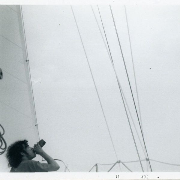 Black and White 1971 Photo - "Drinking with the Sharks" - Man Teen Drink, Bottle, Sailboat, Ocean Sea Adventure - 113