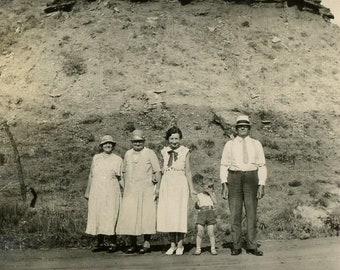 Vintage Snapshot Photo - "Relocating to the Cliffs" - Odd Family Picture, Woman Women, Man Father Dad, Child - 77