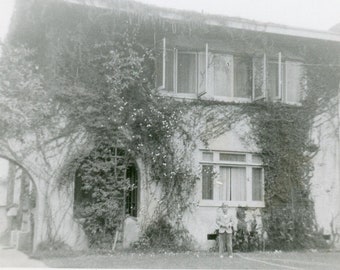 Black and White Photograph - "The Greeting Boy" - Child Standing Out Front House Home - 52