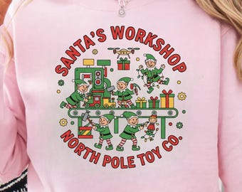 Santa’s Workshop PNG | North Pole Toy Co. Elf Assembly Line Clipart | Cute Christmas Factory Design for T-Shirts & Sublimation