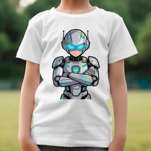 May include: White t-shirt featuring a futuristic robot design. The robot has a silver and teal color scheme with blue glowing accents on the visor and chest. The robot's arms are crossed, and the design is centered on the shirt.