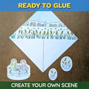 May include: A craft kit with the text "READY TO GLUE" and "CREATE YOUR OWN SCENE". The kit includes a diamond-shaped paper with a landscape scene, and cut-out figures. The scene features a village and wheat.