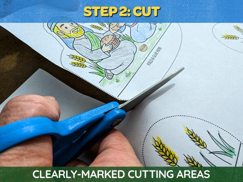 May include: Scissors with blue handles cutting a paper with a cartoon illustration. The paper has the text "STEP 2: CUT" and "CLEARLY-MARKED CUTTING AREAS". The illustration depicts figures and wheat. The paper has dotted lines for cutting.