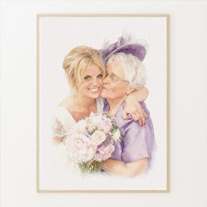 May include: Watercolor painting of a bride and an older woman embracing and kissing. The bride holds a bouquet of pink and white flowers. The older woman wears a purple hat and shirt. The painting is framed in a light wood frame.