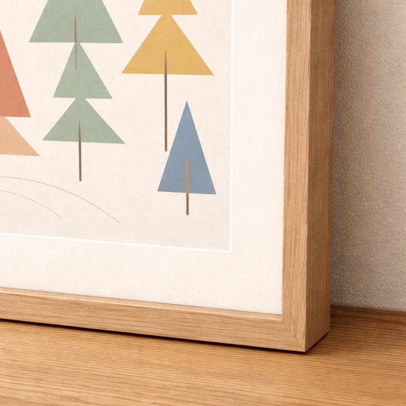 May include: A framed art print featuring a minimalist design of colorful geometric trees in shades of orange, green, yellow, and blue. The artwork is set against a cream background and framed in a natural wood frame.