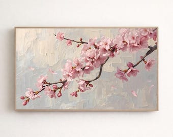 Puede incluir: Pintura enmarcada de una rama de cerezo en flor con flores y capullos rosas. La obra de arte tiene un estilo texturizado e impresionista con un fondo azul claro y blanco. El marco es de color marrón claro.