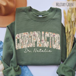Personalized Floral Chiropractor Sweatshirt: Chiropractic Graduation Gift Wildflowers Retro Shirt Chiropractor Office Clothing