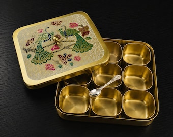 Handcrafted Brass Masala Box – 9 Spice Containers with Peacock Artwork & Spoon