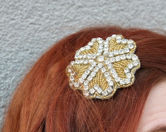 Rhinestone flower barrette in silver and gold finishes