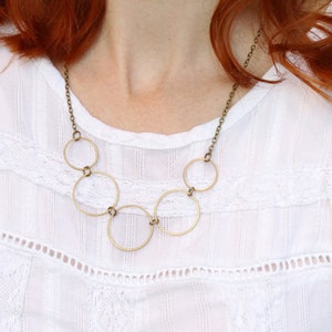 Simple geometric necklace, dainty minimal statement necklace circle bunting, brass circle choker necklace
