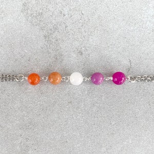 Lesbian necklace in the colors of the lesbian pride flag, choker necklace for pride month or everyday wear, subtle lesbian pride