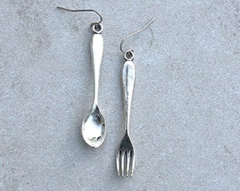 Cute whimsical fork and spoon earrings for women, food themed earrings with hypoallergenic hooks available for casual everyday wear.