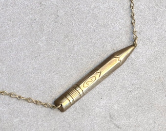Brass pencil charm on a 17 inch choker chain that can be longer or shorter upon request. Great gift for teachers, crafters, or artists.