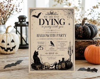 May include: A rectangular Halloween party invitation printed on beige paper with black ink. The text reads: We are just dying to party with you, join us for a Halloween party, come in costume if you dare, Saturday October 25th, and RSVP.