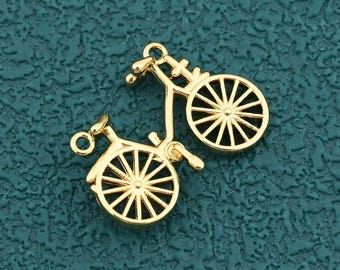 Conector de bicicleta refinado chapado en oro de 18 quilates con diseño de rueda abierta para manualidades de joyería y collares DIY, 20 x 27 mm