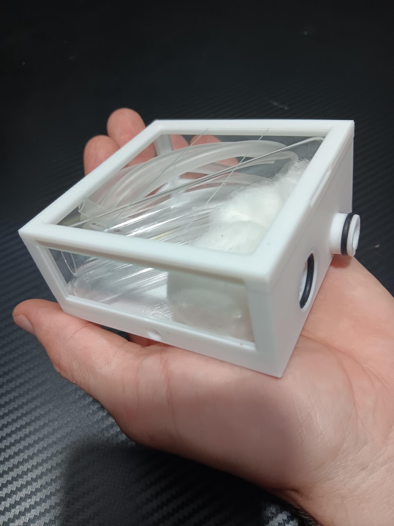 all the contents of the ant farm fit nicely inside of the outworld, and also in my hand.