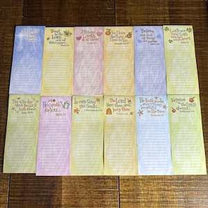 May include: A set of three ceramic mugs with a speckled, matte finish. Each mug features a different color: light blue, cream, and gray. The mugs have a simple, modern design and a comfortable handle.