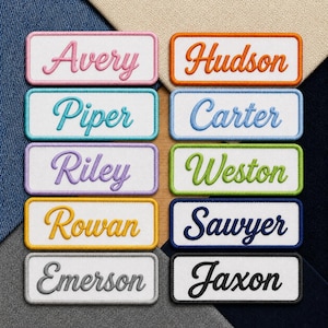 May include: Ten rectangular embroidered name patches with white backgrounds and colored borders. The names Avery, Piper, Riley, Rowan, Emerson, Hudson, Carter, Weston, Sawyer, and Jaxon are stitched in matching colored cursive script fonts.