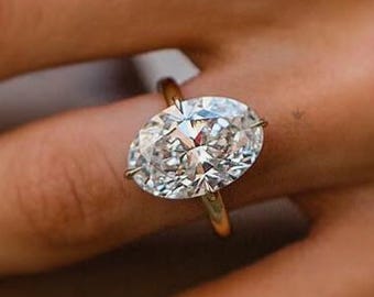 7 Carat Oval Moissanite Engagement Ring: 14K Yellow Gold Solitaire