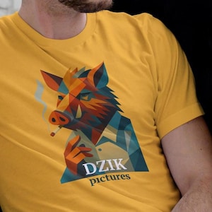 May include: Mustard yellow t-shirt featuring a geometric design of a boar smoking a cigarette. The boar illustration is in shades of orange, red, blue, and brown. The text "DZIK pictures" is below the boar image.