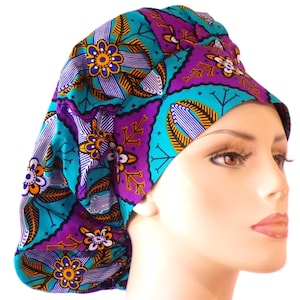 May include: A turquoise and purple patterned surgical scrub hat with a floral design. The hat is made of a soft, comfortable fabric and is designed to be worn by medical professionals.