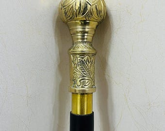 Bastón victoriano de madera con mango de latón y tres pliegues