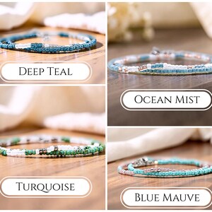 May include: Four delicate beaded bracelets displayed in a grid. The top left is labeled DEEP TEAL with dark teal and white beads. The top right is labeled OCEAN MIST with light blue, white, and metallic beads. The bottom left is labeled TURQUOISE with green, white, and silver beads. The bottom right is labeled BLUE MAUVE with light blue and mauve beads.