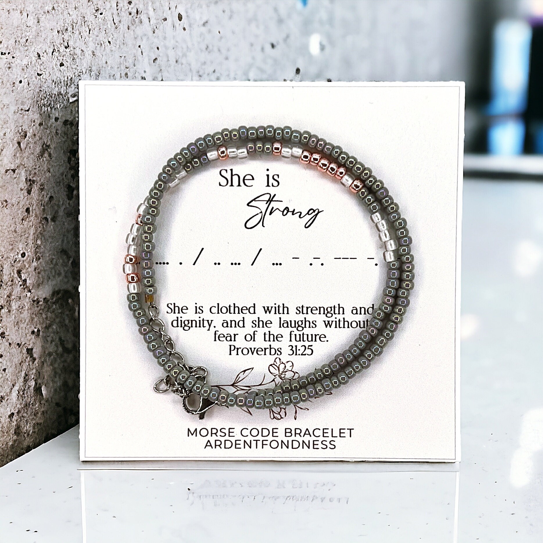 She is clothed in strength and shop dignity bracelet