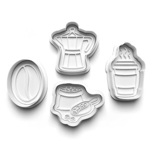 May include: Four white plastic cookie cutters in the shapes of coffee-related items. The shapes include a coffee bean, a stovetop espresso maker, a bag of coffee beans with a scoop, and a to-go coffee cup with steam.