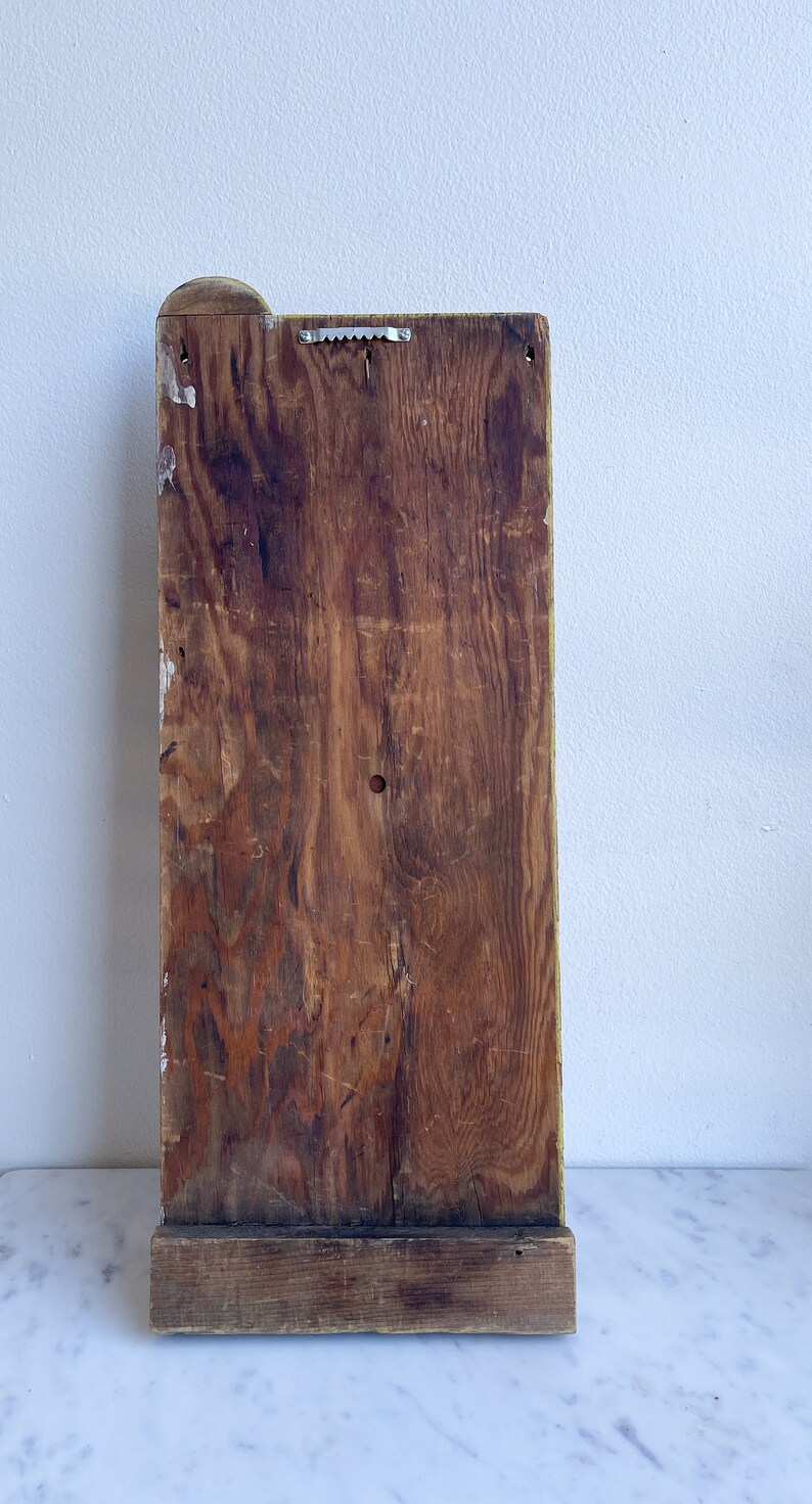 Vintage Hardware Store Lawn Mower Repair Parts Red and Yellow