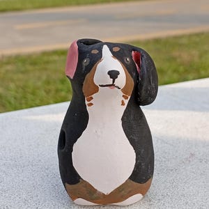 Dog on the wind whistle n.1