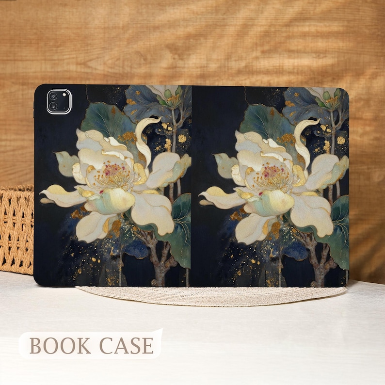 May include: A black book case featuring a large, detailed floral design with white petals, yellow centers, and green leaves. Gold accents are scattered throughout the design. The text "BOOK CASE" is at the bottom.
