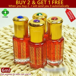 May include: Several small, red perfume bottles with gold lids and jewel-toned embellishments. Each bottle features a gold decorative pattern. The image includes the text "BUY 2 & GET 1 FREE" and "6ml".