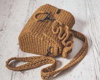 El patrón de crochet contiene instrucciones paso a paso sobre cómo hacerlo.