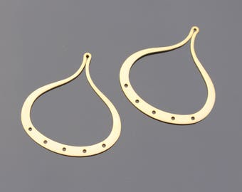 May include: Two gold-colored, teardrop-shaped earring components. Each component has a curved, open design with a small loop at the top and several evenly spaced holes along the bottom curve. The earrings are displayed on a dark gray surface.