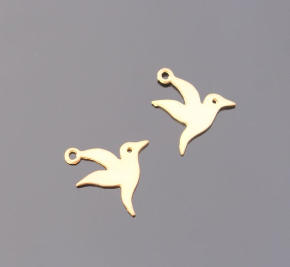 SCULPTURE D’OISEAU EN métal doré ( sans doute en laiton) EUR 15,00