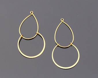 May include: Two gold-colored earring components. Each earring features a teardrop shape connected to a circular hoop. The components are made of thin metal and are designed for jewelry making.
