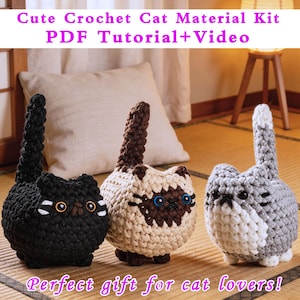 May include: Three crochet cat figures in black, beige, and grey. The black cat has orange eyes, the beige cat has blue eyes and brown markings, and the grey cat has white accents. The text "Cute Crochet Cat Material Kit PDF Tutorial+Video" is at the top.