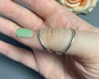 Anillo férula minimalista para el pulgar: soporte sencillo y elegante para la artritis y el dedo en gatillo.