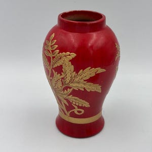 Vintage Chinese Red Ginger Jar With Gold Floral Designs and Lid With Gold Accents