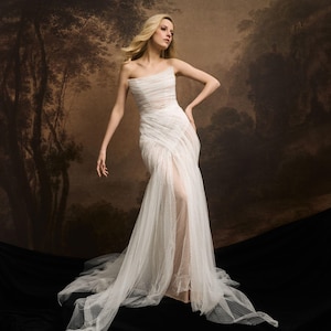 Exclusive tulle mermaid wedding dress a train. Сorset wedding gown transparent effect. Bridal dress with draping and open shoulders VESNA