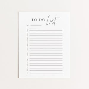 May include: A white To Do List notepad with the words "TO DO List" in a handwritten font. The notepad has a space for the date and a series of checkboxes and lined spaces for tasks.