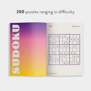 May include: Open book with a Sudoku puzzle. The left page has the word "SUDOKU" in large, white letters against a gradient background of purple, pink, and yellow. The right page displays a "VERY EASY" Sudoku grid.