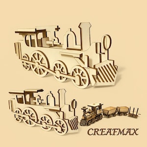 May include: Two wooden train models are displayed, one large and one small, with additional train cars. The larger train has detailed wheels and a classic steam engine design. The smaller train is a miniature version. The text "CREAFMAX" is visible.