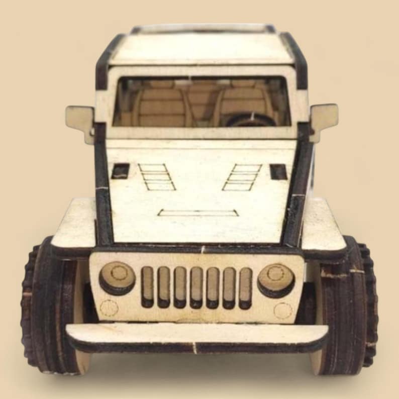 May include: A wooden model of a light-colored SUV with dark brown tires and accents. The vehicle has a detailed front grille, side mirrors, and visible interior seats. The toy car is designed with a boxy shape.
