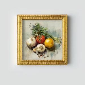 May include: A framed still life painting depicting a selection of fresh ingredients. The artwork includes a red tomato, a yellow lemon, garlic bulbs, and fresh herbs. The frame is gold with a textured pattern.